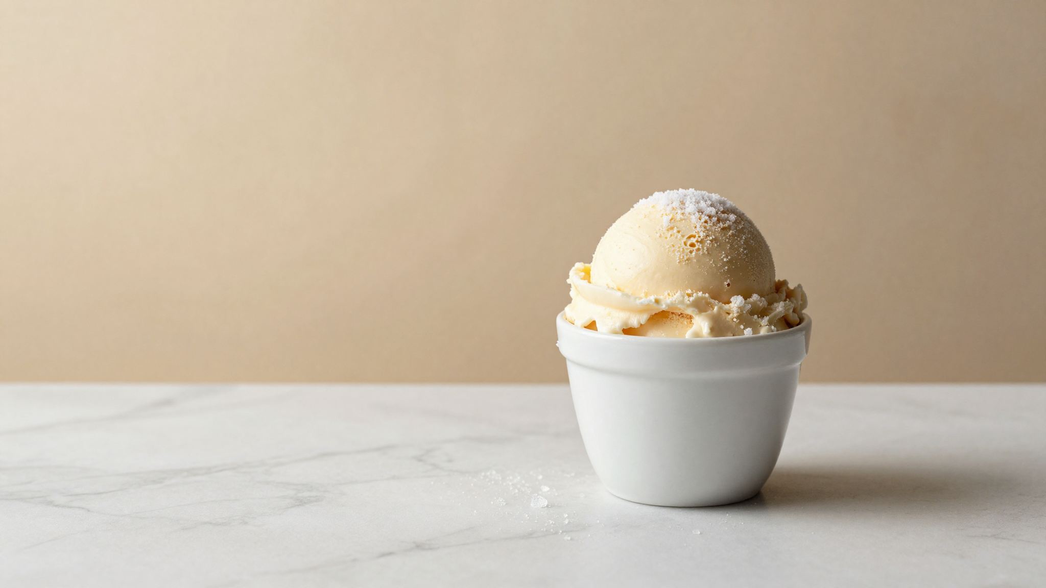 Scoop of Italian gelato with frost and tiny ice crystals on the surface
