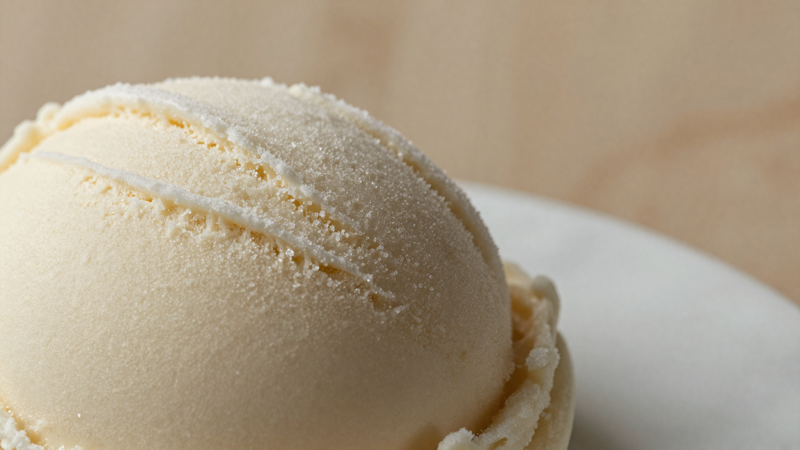 Extreme macro of gelato surface showing fine ice crystals catching light